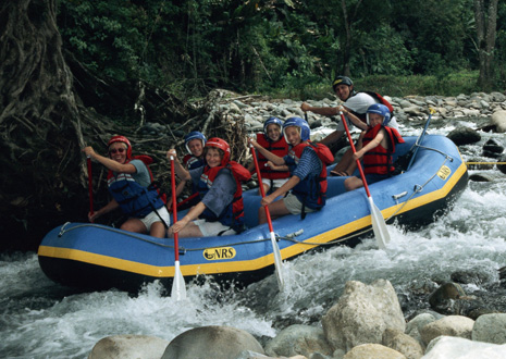 Family rafting tour in Turrialba on the Pejibaye River.